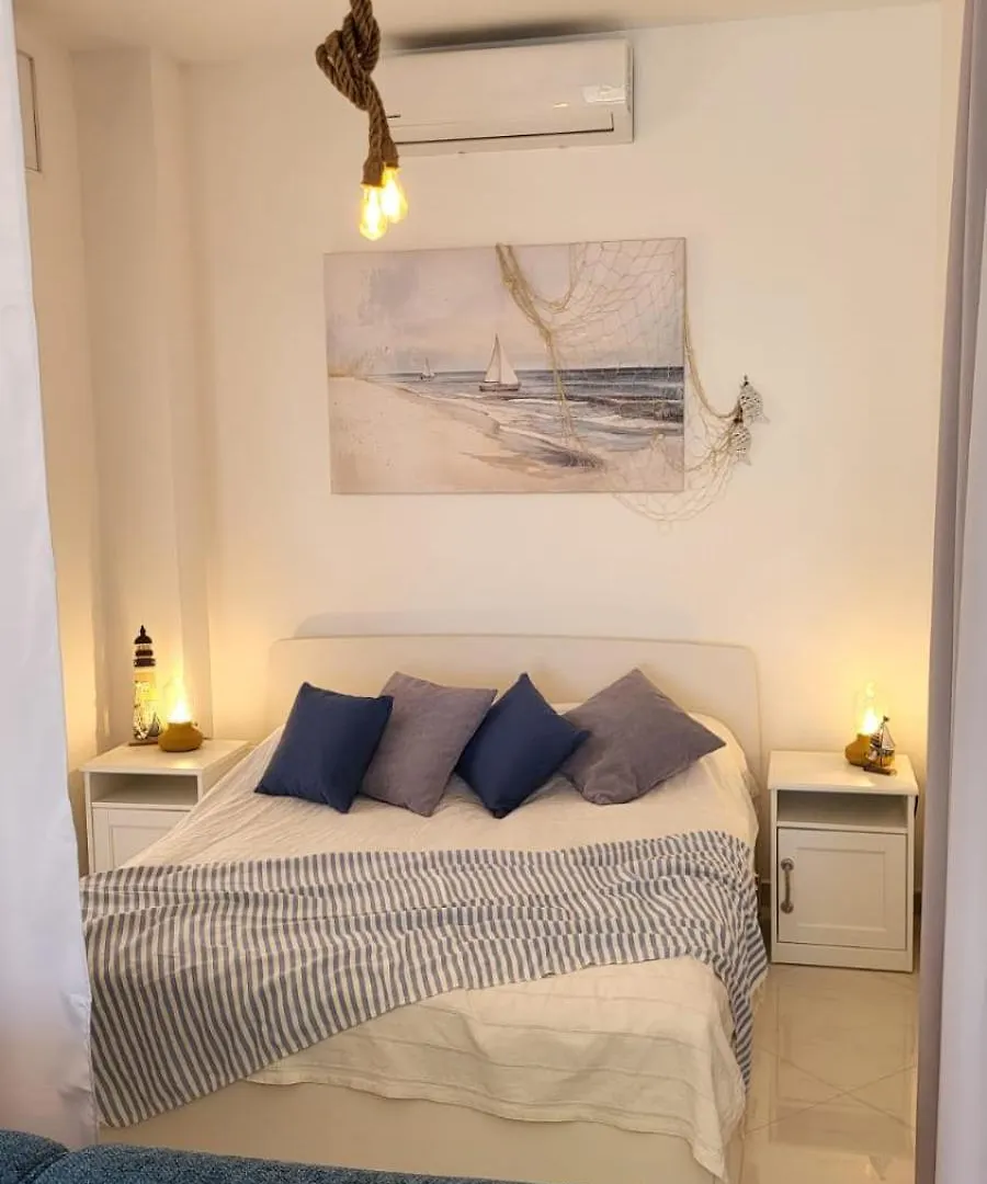 The Seafront Pearl - Ostia Apartment