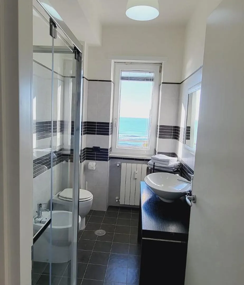 The Seafront Pearl - Ostia Apartment Italy